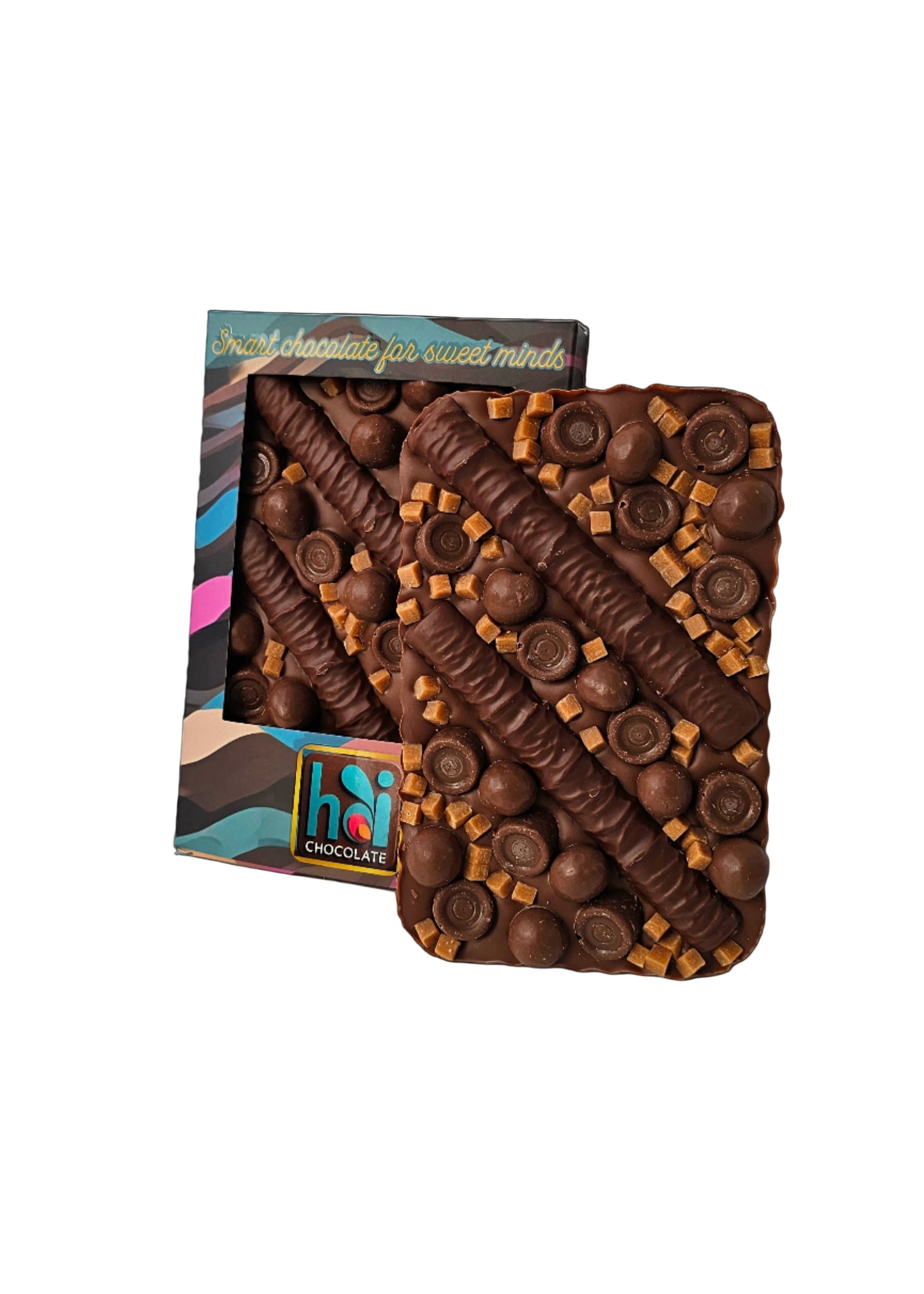 Chocolate caramel in a decorative box on a light gray background